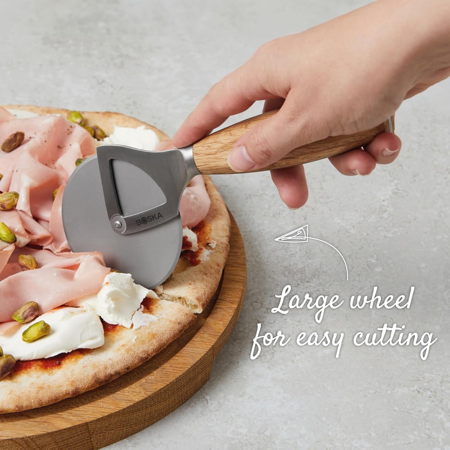 Boska Stainless Steel Pizza Cutter - Oslo Multifunctional Pizza Wheel Cutter - Handheld Food Slicer - Silver Non-Stick Roller - For Kitchen Cooking
