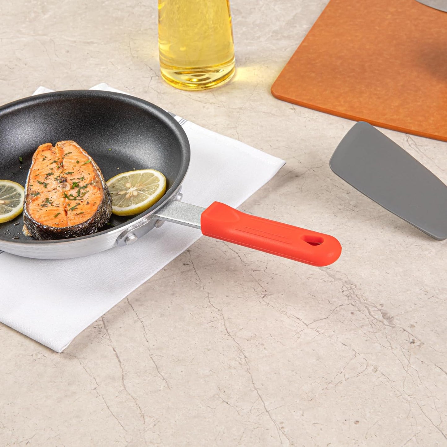 Restaurantware Pan Handle Sleeve 1 Pack Of 4.25" Removable Silicone Pot Handle Holder Fits 8-inch And 9-inch Pans No-Slip Heat-Resistant Dishwashable Red Aluminum Fry Pan Covers for Home Kitchen